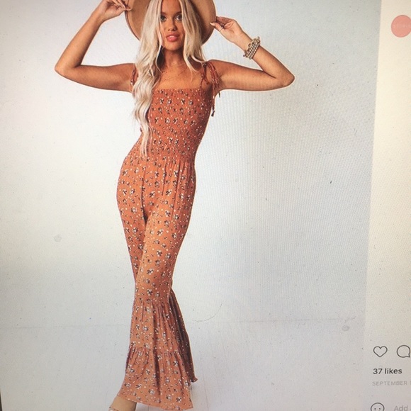 This jumpsuit in burnt orange.